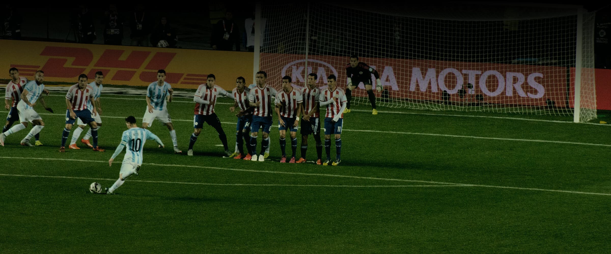 Lionel Messi striking a free kick