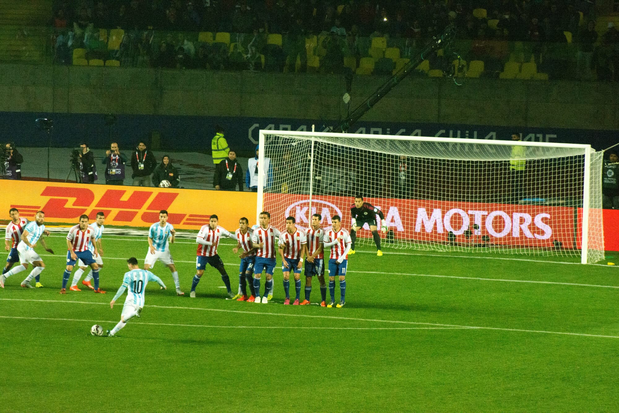 Messi striking a free kick for Barcelona